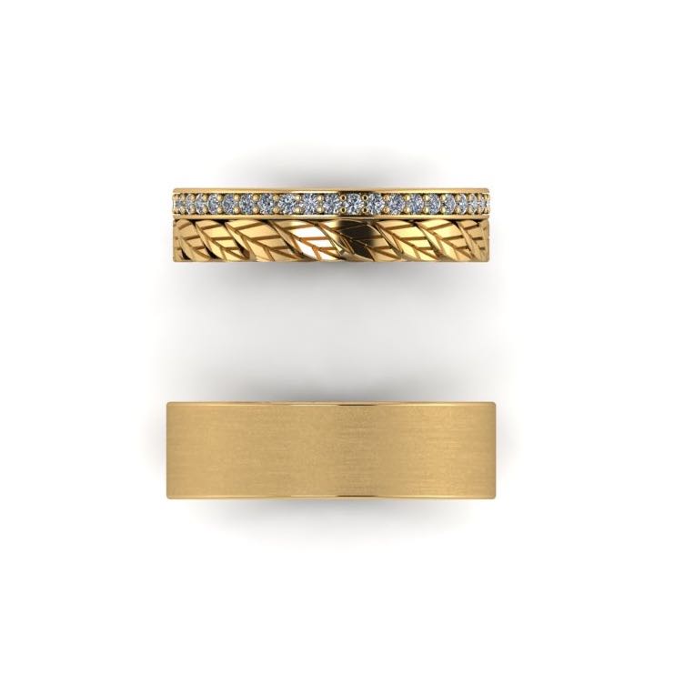 Geel gouden ring met enkel blaadje en rij diamanten.